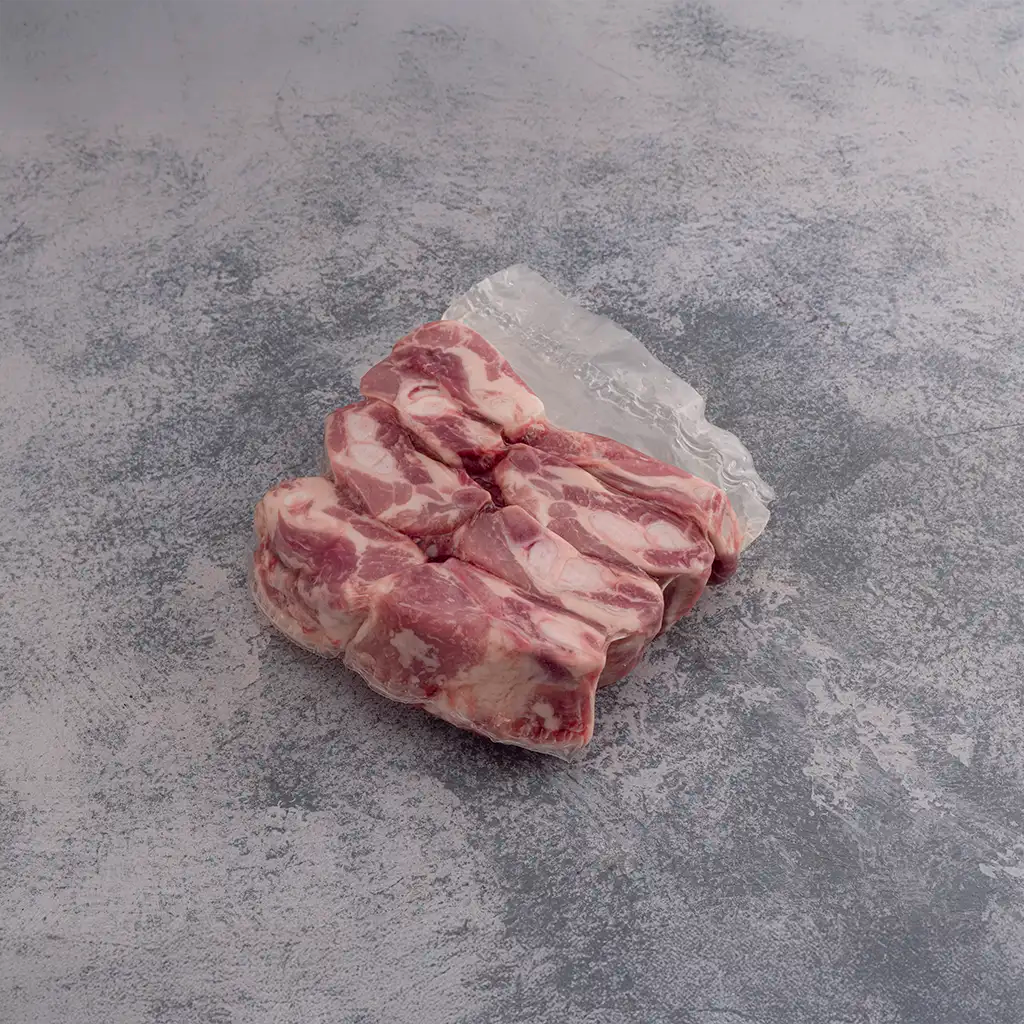 Empaque plástico para costillas termo encogible