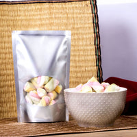 Bolsa para masmelos y snacks en la parte delantera tiene ventana